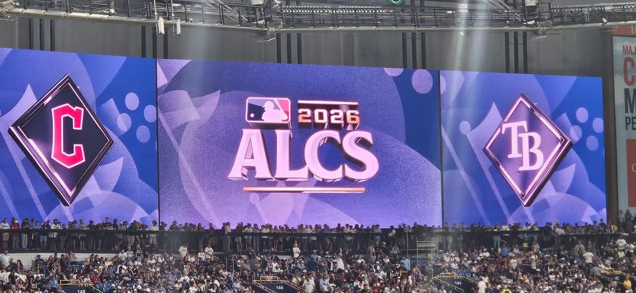 The Tropicana Field video board displaying the Guardians and Rays logos alongside the 2026 ALCS graphic above the crowd