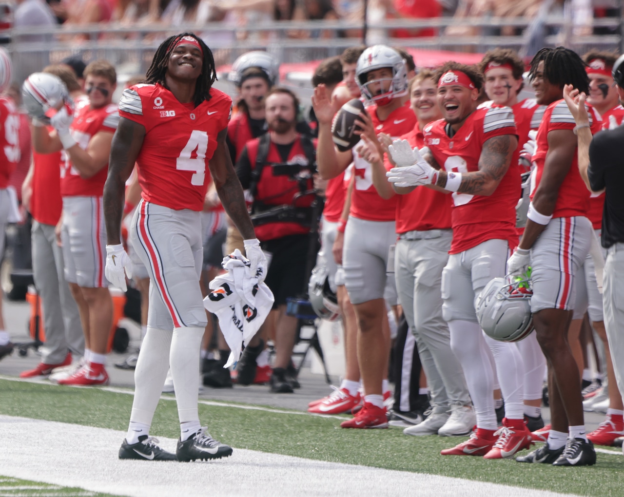 Ohio State wide receiver Jeremiah Smith celebrates near teammates during the Kent State game