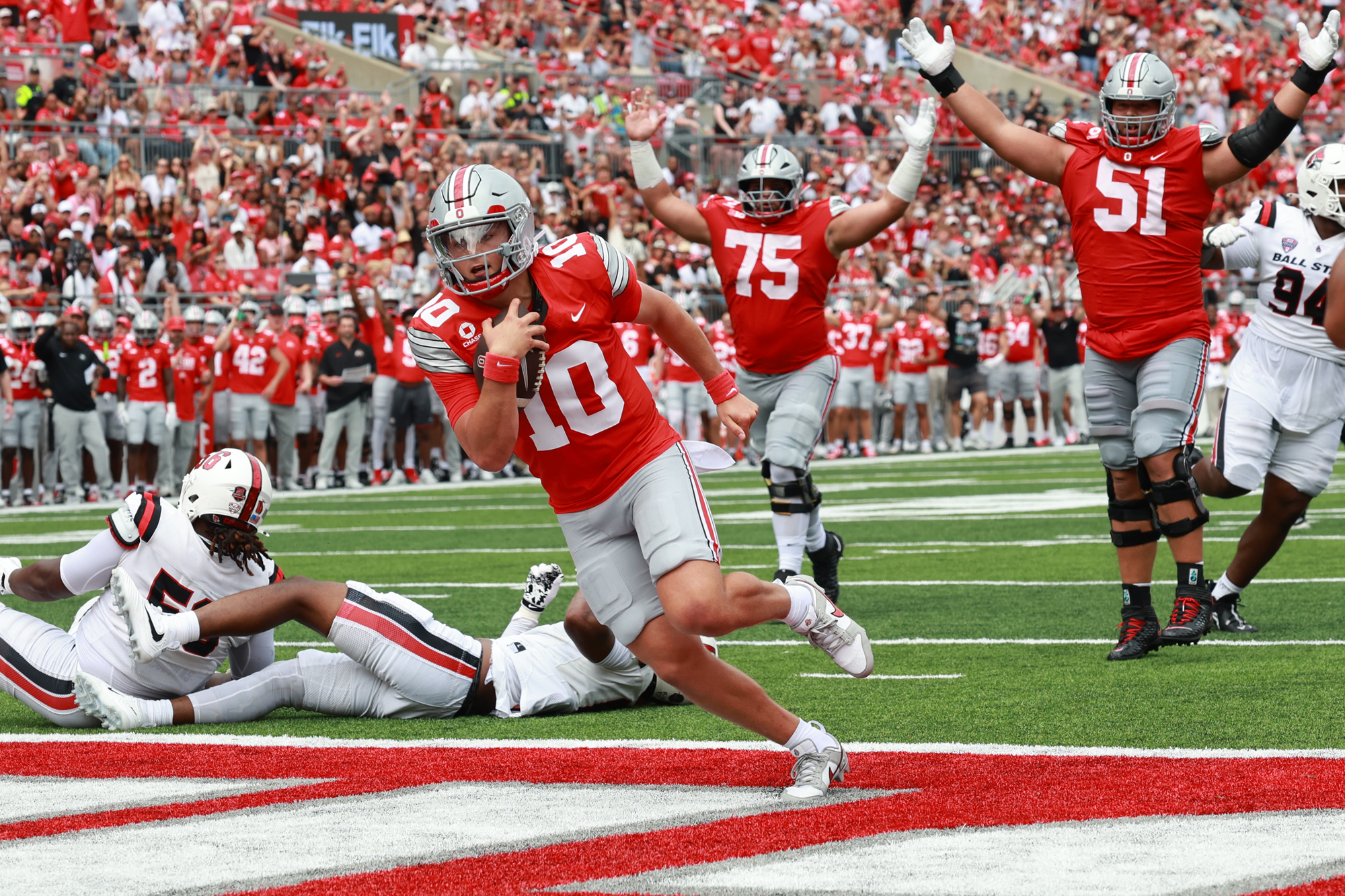 Ohio State quarterback Julian Sayin runs for a touchdown against Ball State in 2026