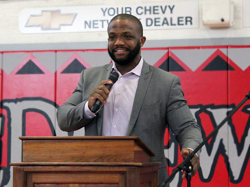 Maurice Clarett speaks from a podium at an event in Ohio