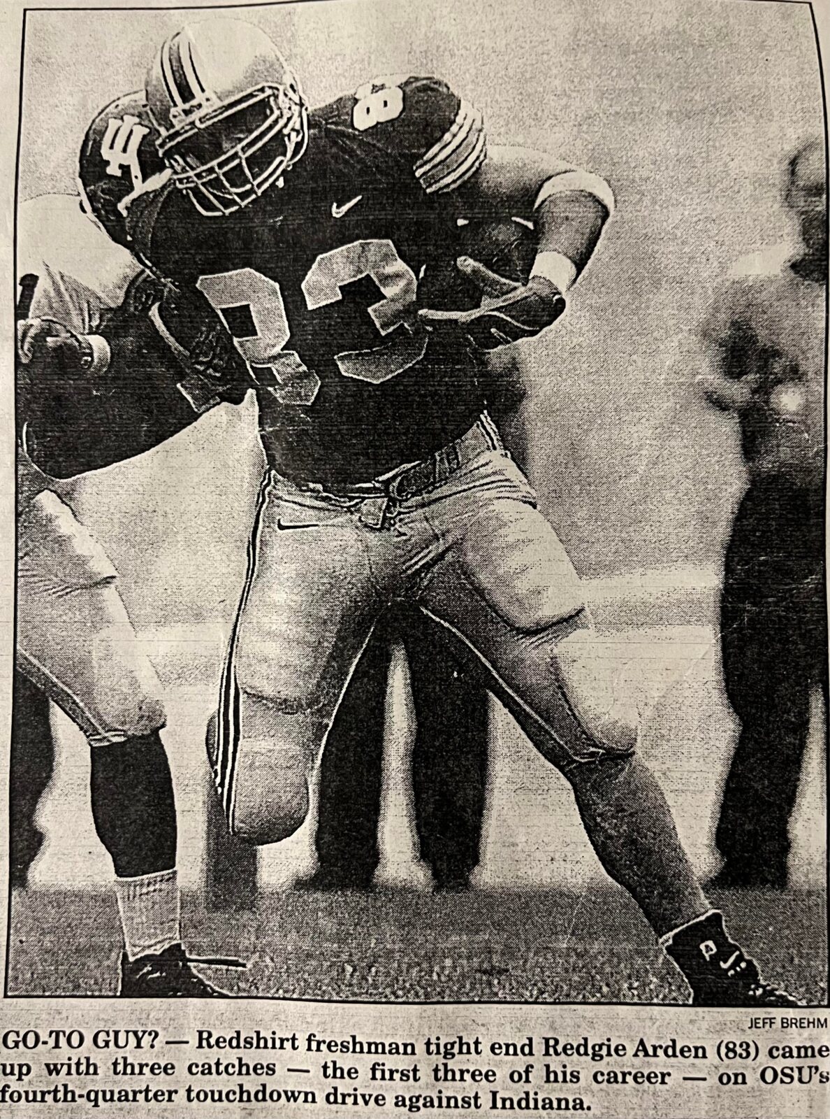 Redgie Arden carrying the football for Ohio State